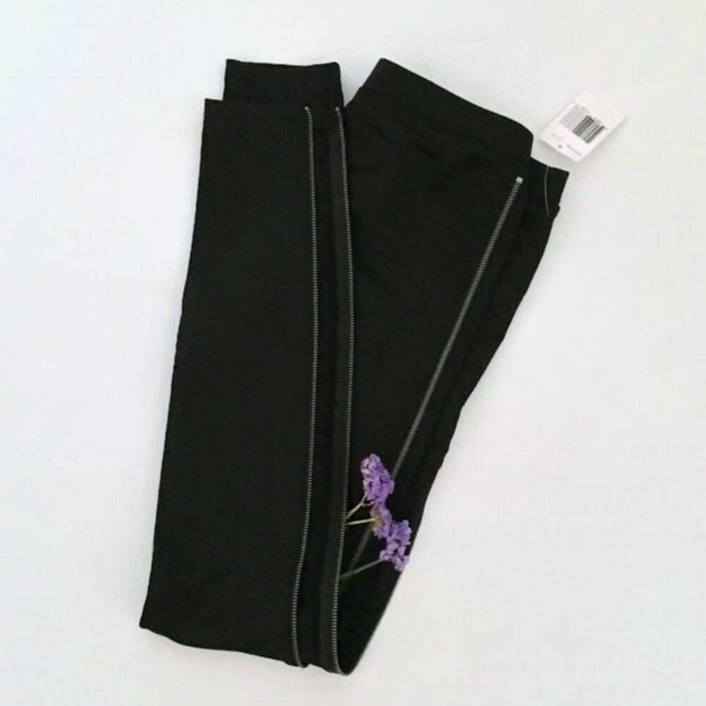 Black skinny pants with zippers